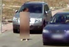 ماجرای زن نیمه برهنه در خیابان و دستگیری توسط پلیس